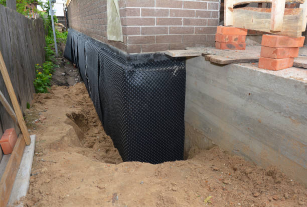 Happy homeowners after waterproofing job in Holland